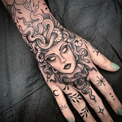 medusa hand tattoos.